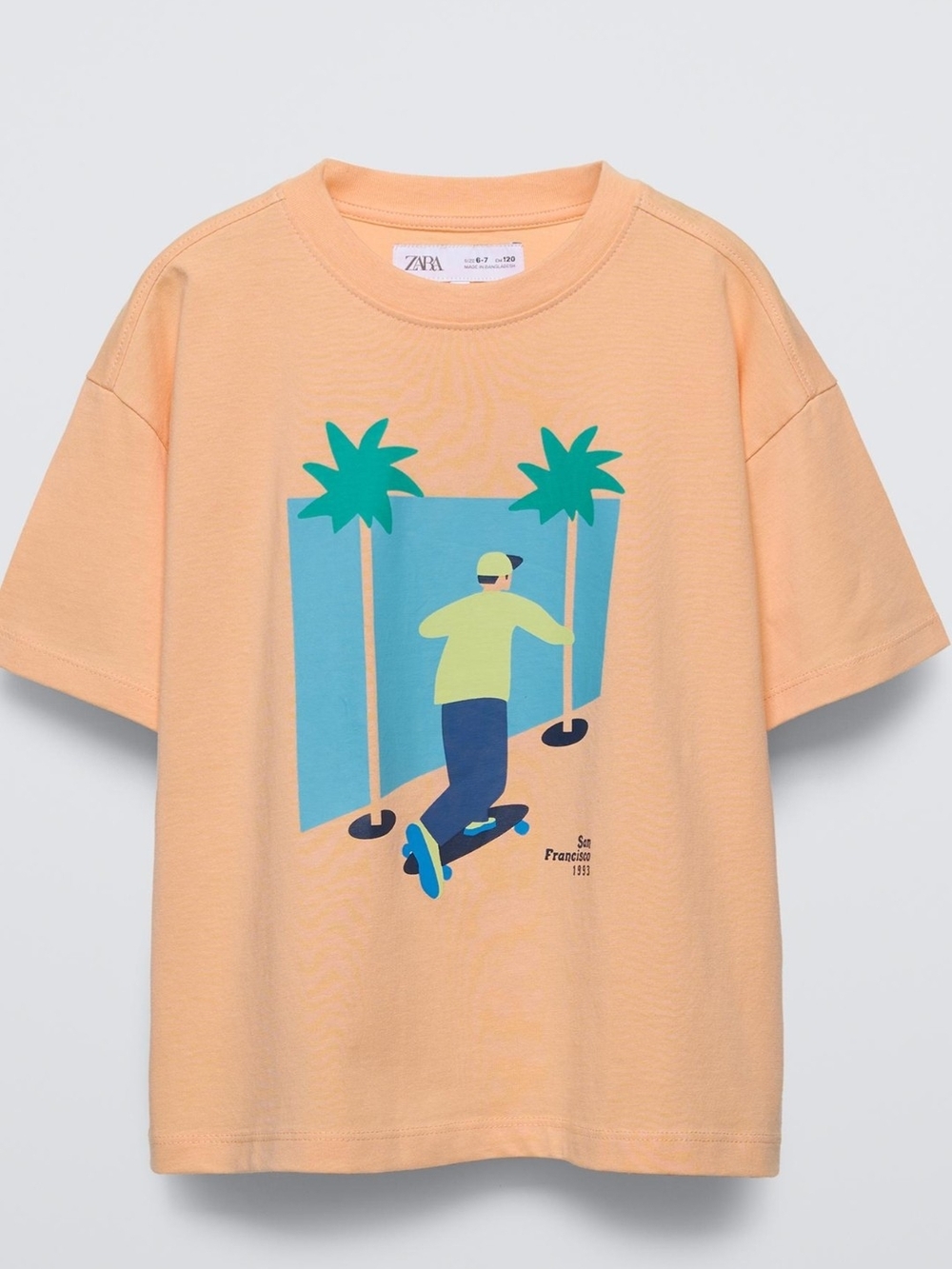 Zara Peach Short-Sleeve Tee with Skateboard Graphic
